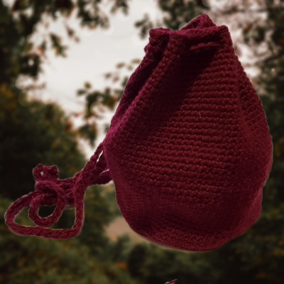 Crochet drawstring bag made of dark red wool